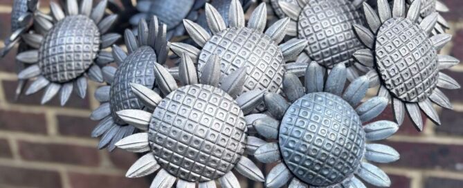 Wrought iron sunflowers arranged for Heart of Kent Hospice’s Sunflower Appeal