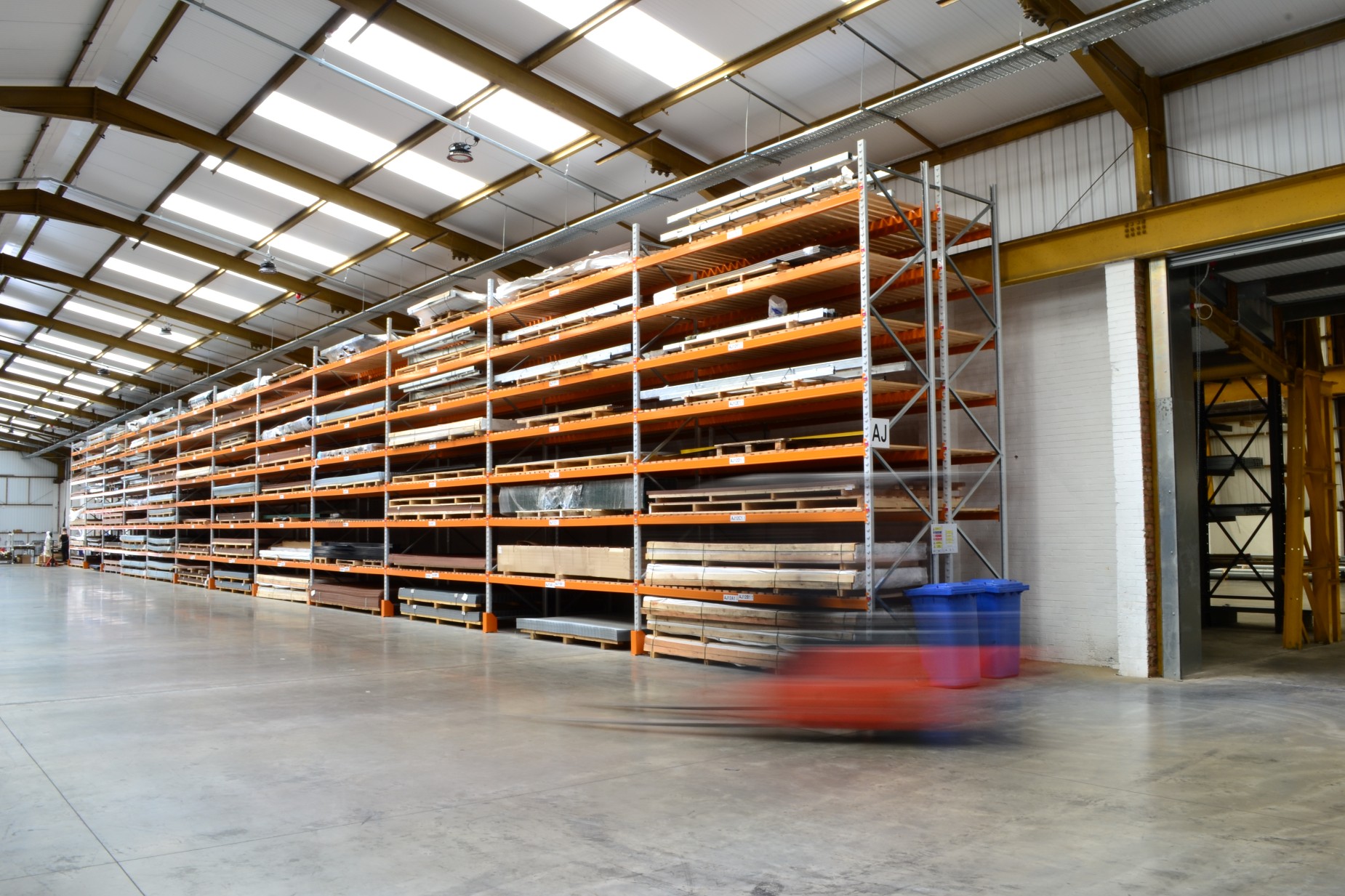 speedforklift A forklift moving through the FH Brundle warehouse